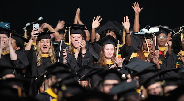 Images of graduates in caps and gowns 