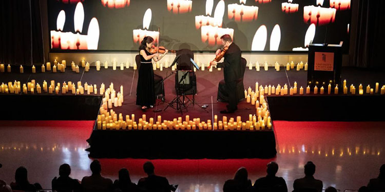 Agnes Tse on violin and Colin Sorgi on viola with digital candlelit background