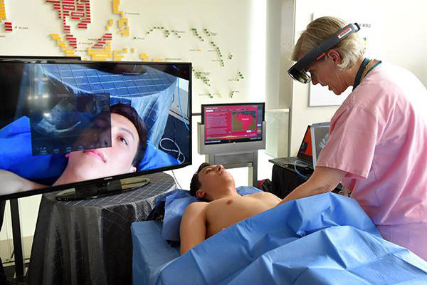 A surgeon demonstrating the augmented reality technology