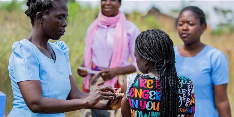 A girl receives Typbar TCV vaccine for typhoid protection in a study to test the efficacy of typhoid conjugate vaccine.