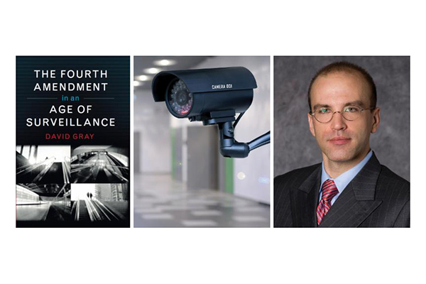 A copy of the printed book, a surveillance camera, and author David Gray