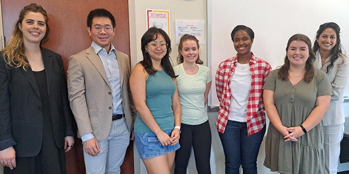 Professors Molly Ryan, far left, and Maneka Sinha, far right, are shown with the first cohort of Forensic Defense Clinic students at Maryland Carey Law