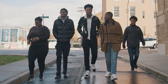 The CURE Scholars walk down a Baltimore street