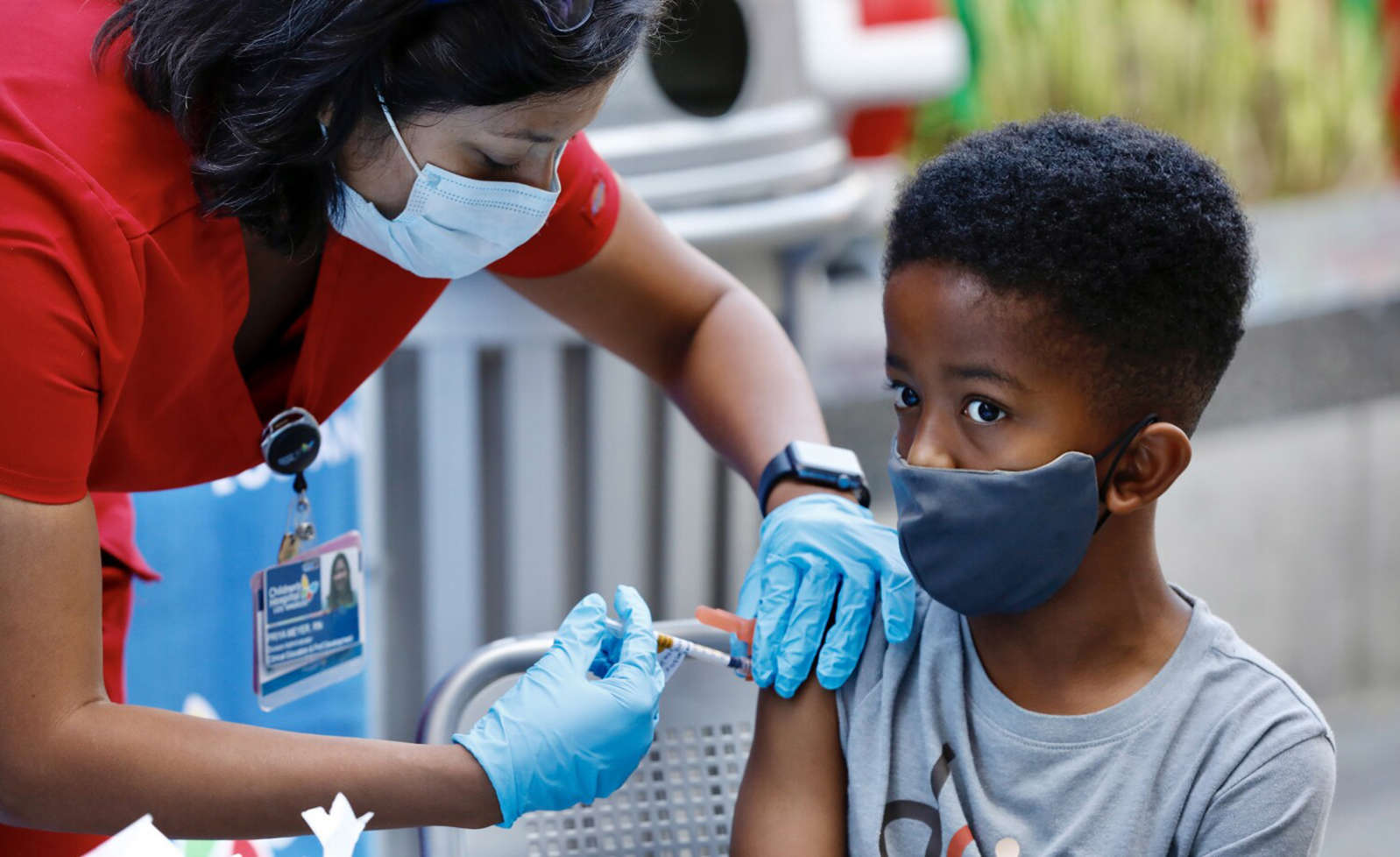 Seven-year-old Ari Alleyne receives the children's dose of the Pfizer COVID-19 vaccine at Children's Hospital Los Angeles