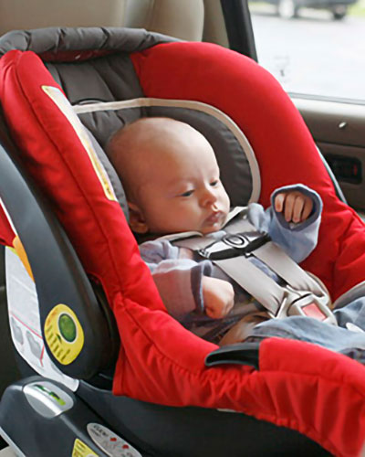 An infant in a car seat