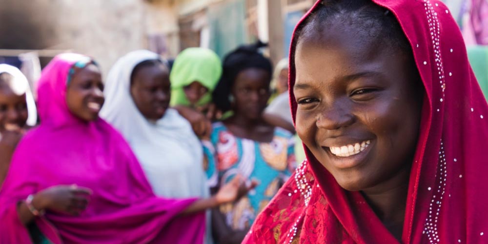 Women wearing colorful hijabs