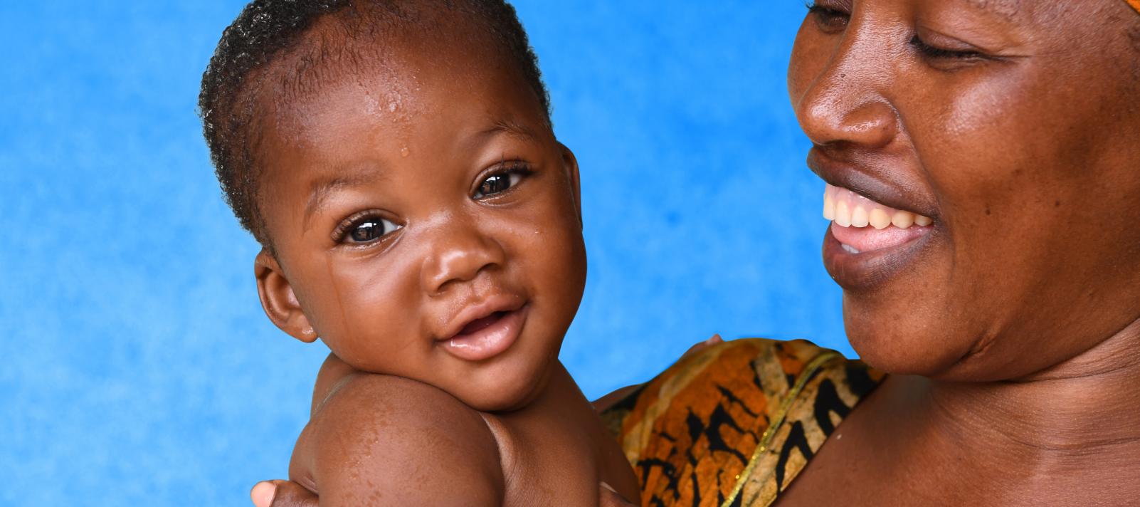 Madoue, a 36-year-old mother, is cuddling her 5-month-old son Abdel