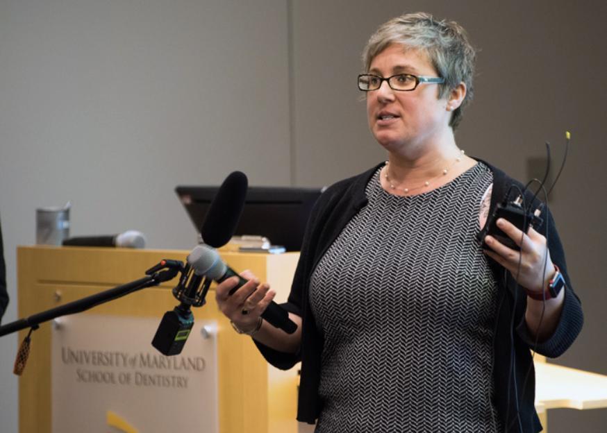 Title IX coordinator Mikhel Kushner addresses President Perman's Quarterly Town Hall in January 2019.