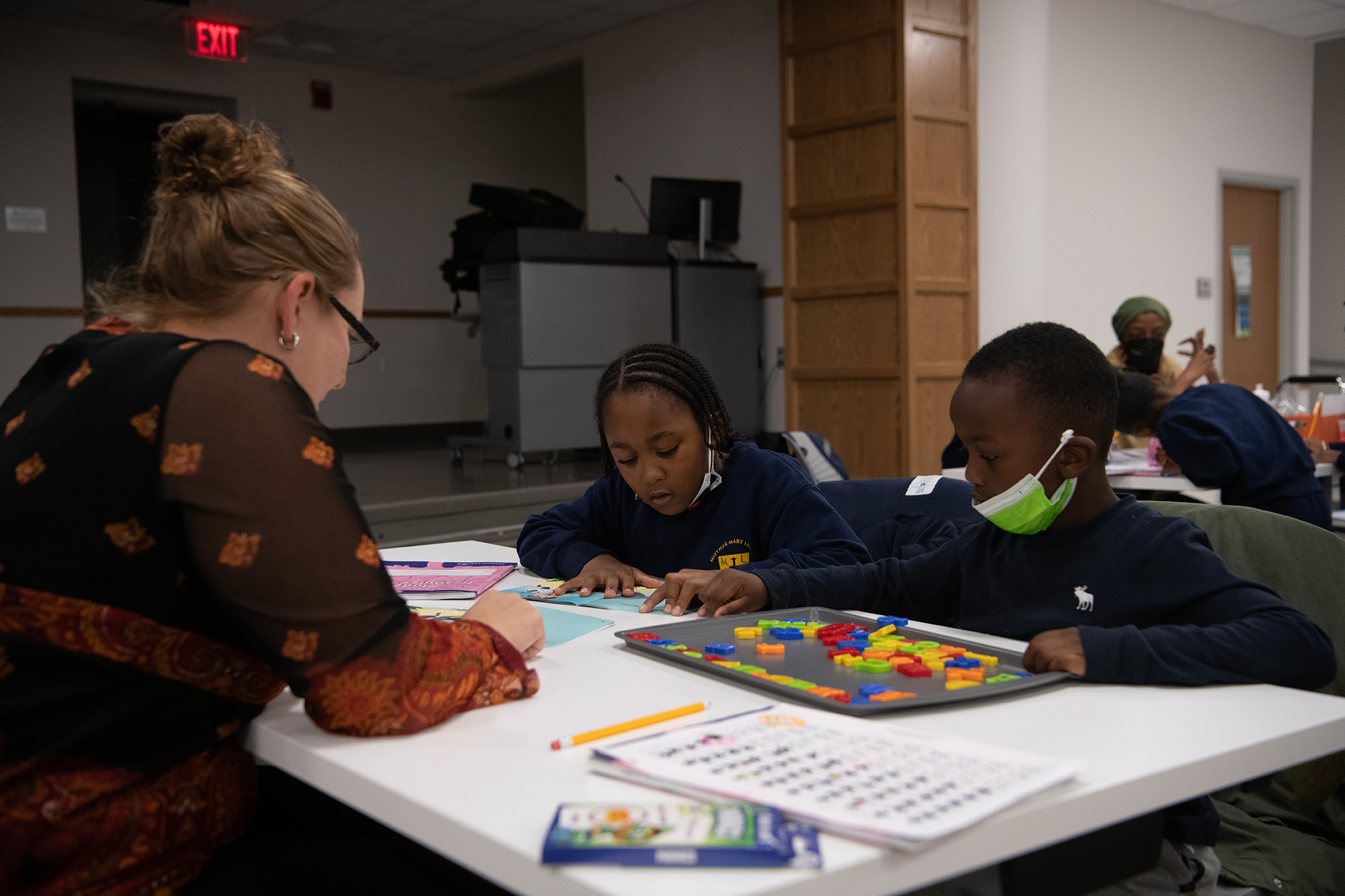 Two Students with a tutor