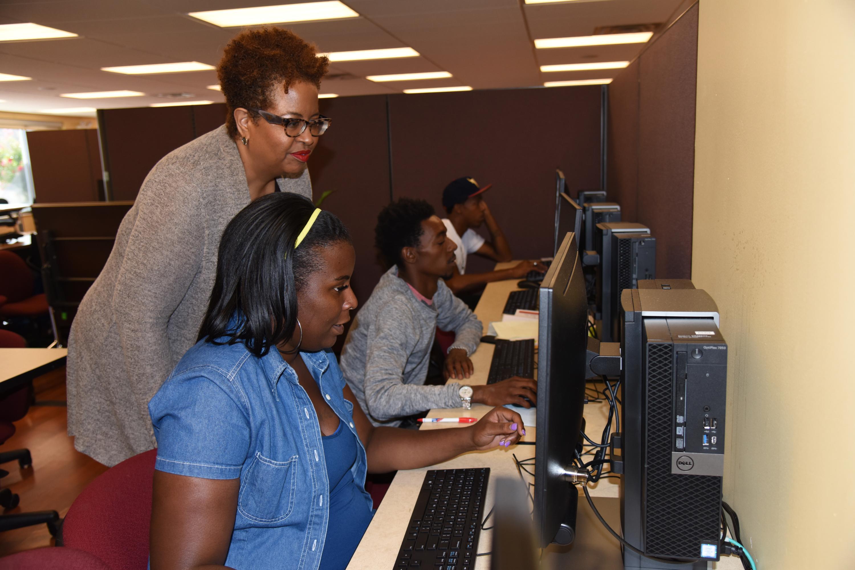 Lisa Rawlings helping out in the computer lab