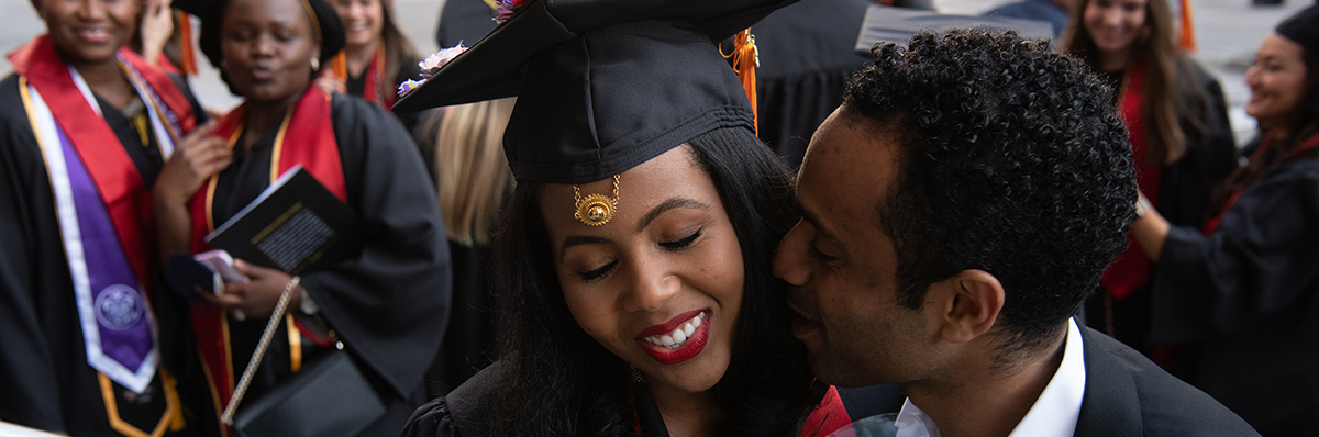 A man and a woman at graduation