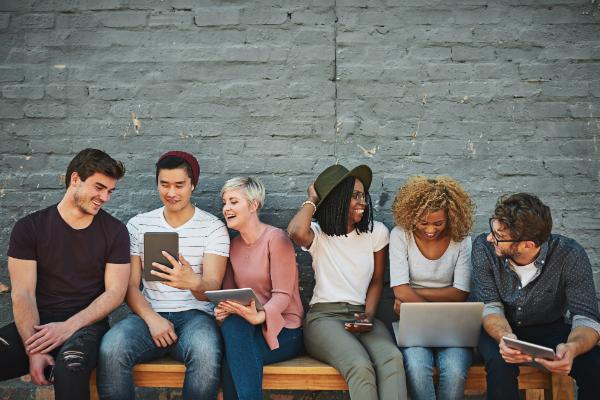 People looking at their devices