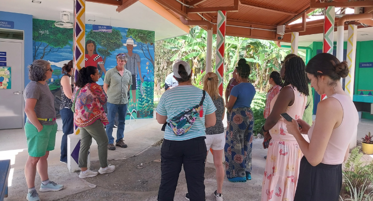 A group of people gather outside a clinic in Costa Rica