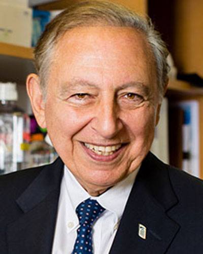 Headshot of a man in a suit