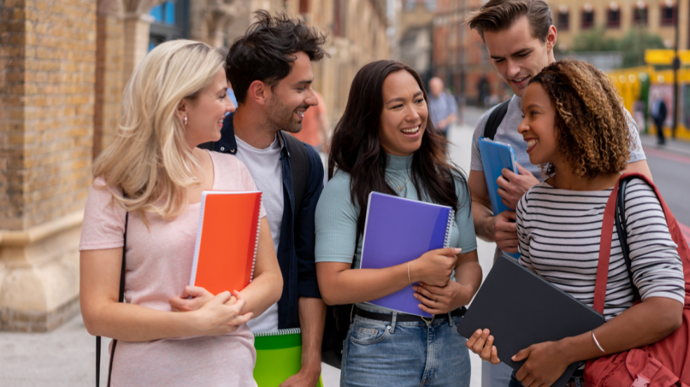 Students huddle together to talk