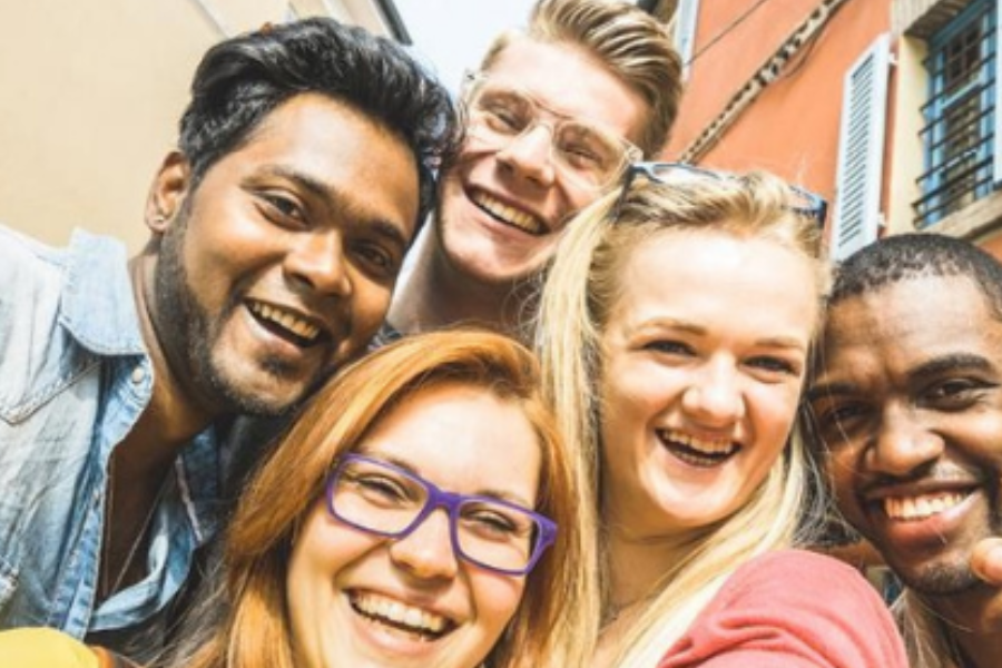 A group of students pose for a selfie