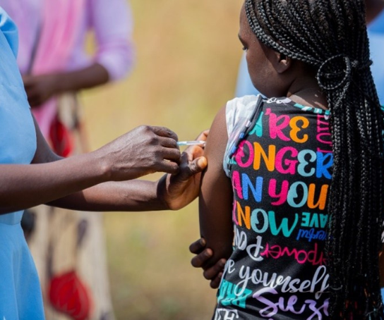 A child receives the typhoid vaccine