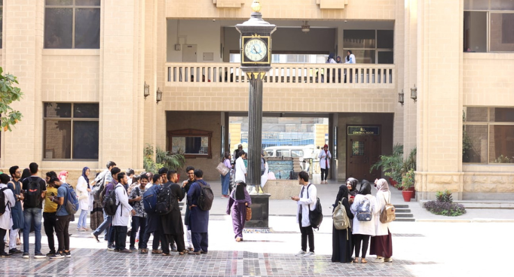 Students gather outside Dow University