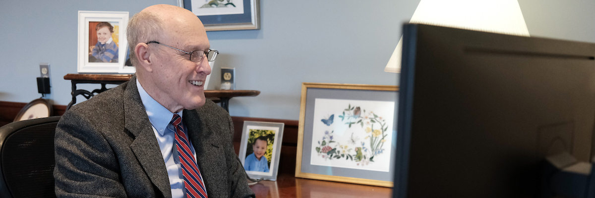 Bruce E. Jarrell, President of UMB, works at his desk