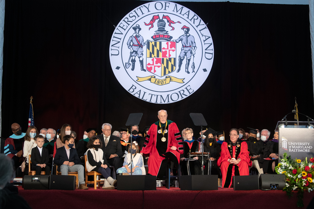 President Jarrell delivers his inaugural address as Lawrence Hayman and Jarrell's six grandchildren watch.