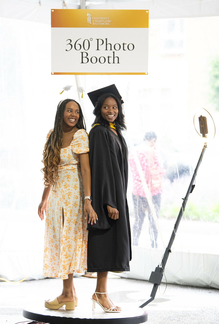 The 360-degree photo booth was a big hit with UMB graduates and their family and friends.!