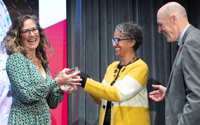 Kathleen Hoke receives award from Dean Laurent