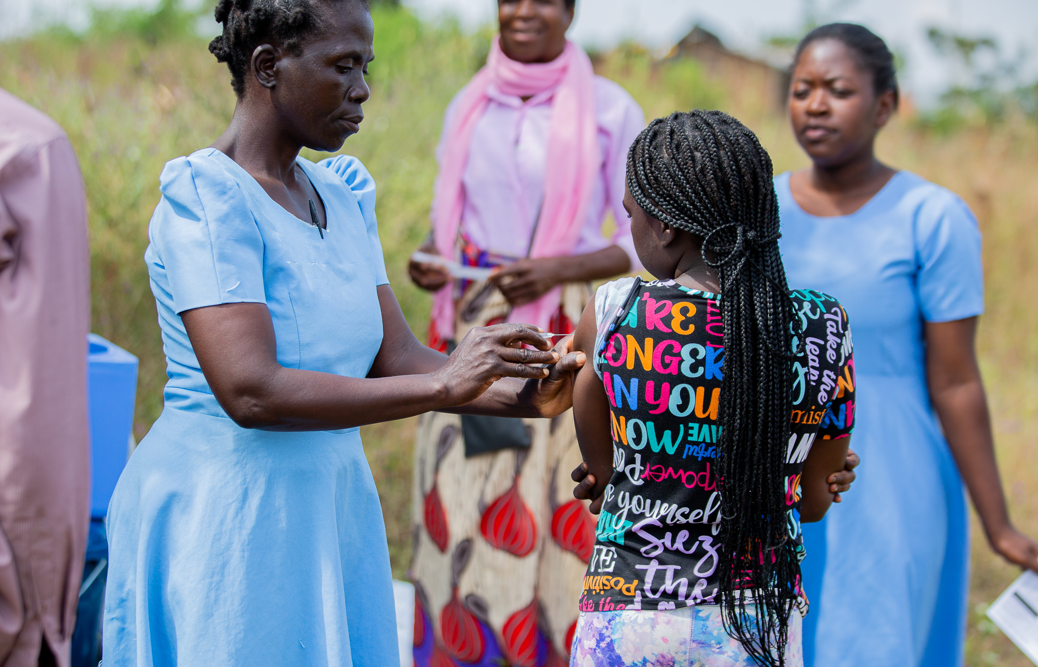 Girl receives Typbar TCV vaccine for typhoid protection in study to test efficacy of typhoid conjugate vaccine.