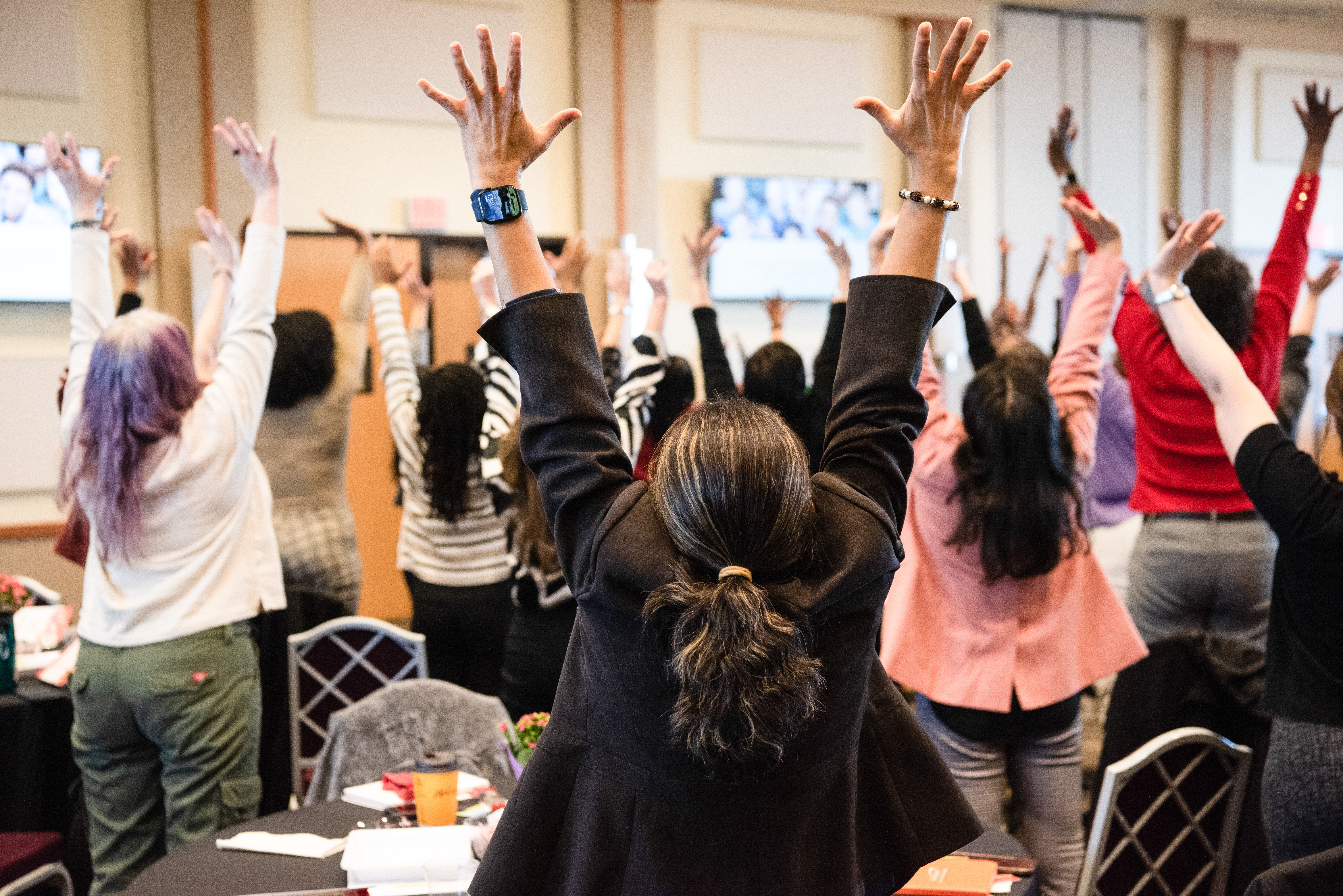 During a mindfulness exercise, symposium attendees learn to relax.