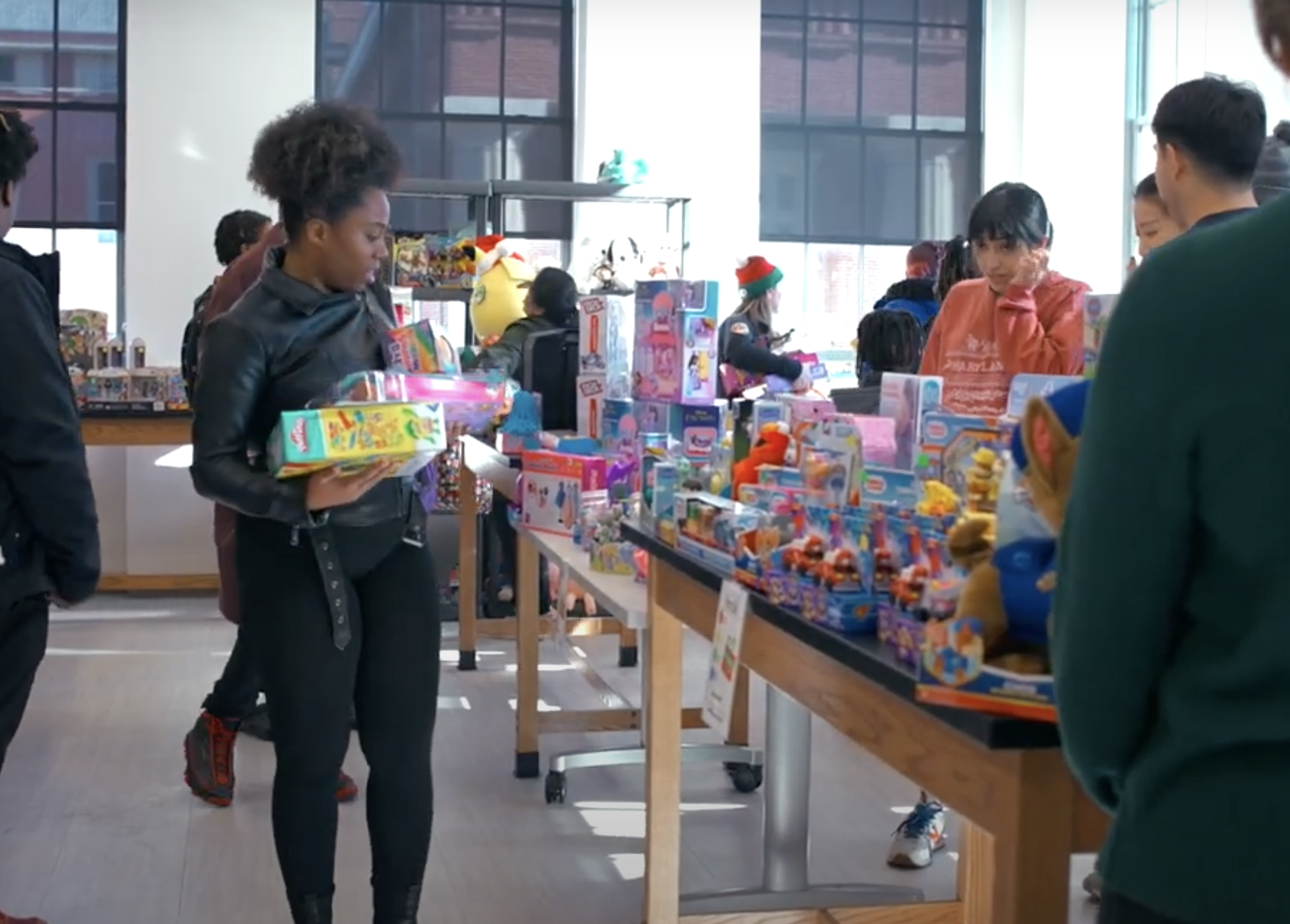 Shoppers look for gifts at the Christmas Store, which was held Dec. 15-16 at the UMB Community Engagement Center.