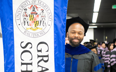 A graduate of the University of Maryland Graduate School at the 2019 University of Maryland, Baltimore Commencement.