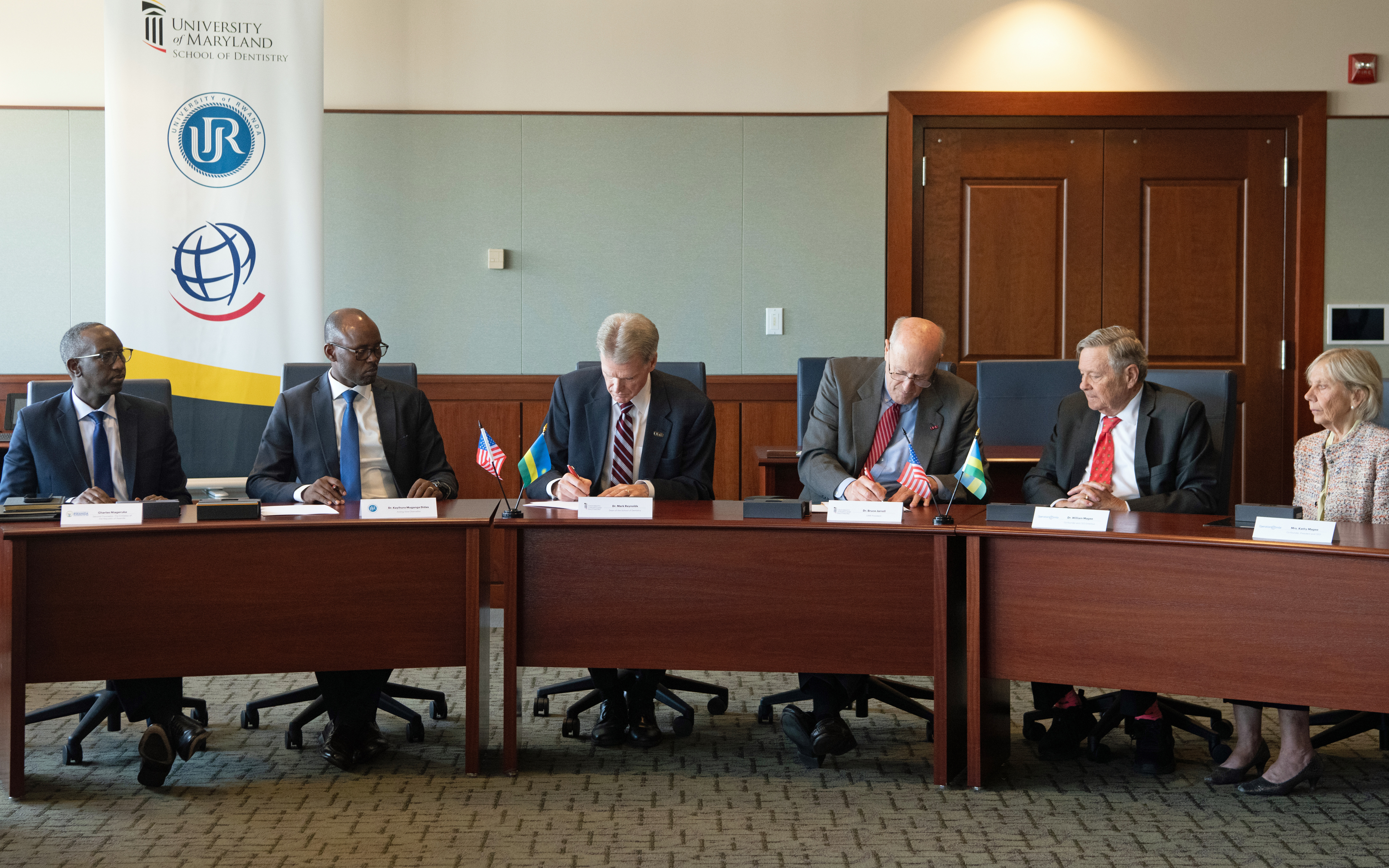 (L-R) Charles Ntageruka, second chancellor, Embassy of the Republic of Rwanda; Kayihura Muganga Didas, acting vice chancellor, University of Rwanda; UMSOD Dean Mark Reynolds; UMB President Bruce Jarrell; William Magee, CEO emeritus, Operation Smile; Kathy Magee, CEO, Operation Smile