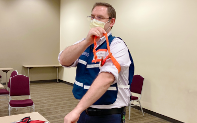 Christopher Stanton, MS, deputy director of UMB Office of Emergnecy management, demostrates using the Stop the Bleed kit. CHARLES SCHELLE/University of Maryland, Baltimore