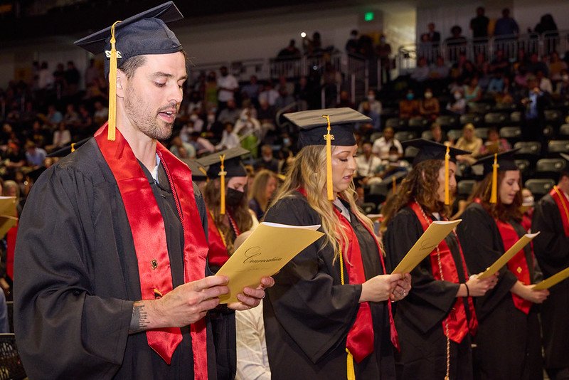 Graduates of the University of Maryland School of Nursing recite the Nursing Oath.