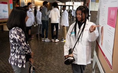 Students in the UMB CURE Scholars Program present their reserach at the annual CURE STEM Expo.