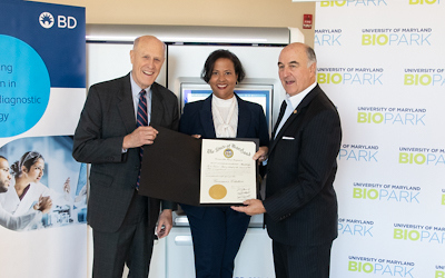 UMB President Bruce E. Jarrell, BD worldwide president of Integrated Diagnostic Solutions, Brooke Story, and MD Commerce Secretary Mike Gill at the UM BioPark BD Innovation Center. 