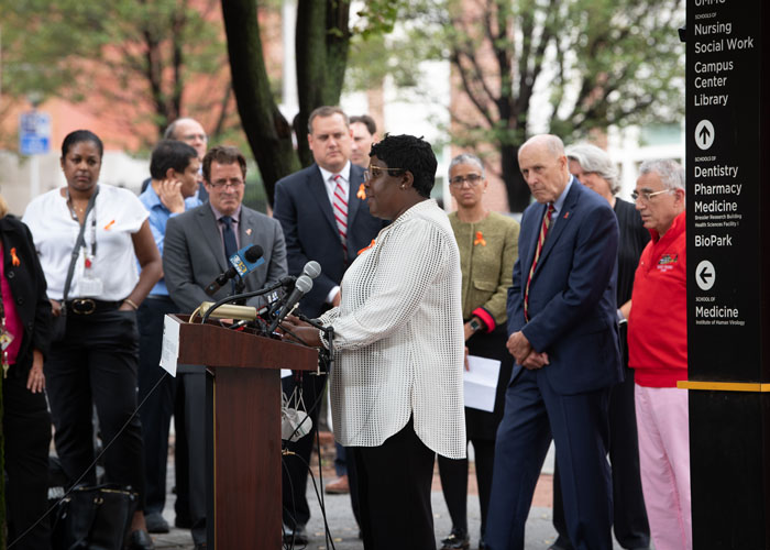 Liza Holley, a Baltimore City community member who lost her son to violence in the city last year, speaks about what the launch of the UMB Center for Violence Prevention means to her and her family.