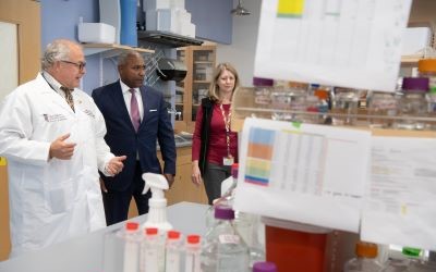 Allan Doctor, Kevin Anderson, and Elaine Haynes during a tour of CBOTH at UMSOM.