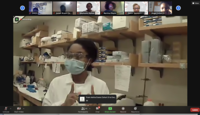 Ebehiremen Ayewoh and Brianna Scotland, both PhD students in the University of Maryland School of Pharmacy’s Department of Pharmaceutical Sciences, show the scholars how to make ice cream sundaes using liquid nitrogen. 