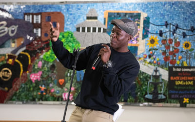 In front of a small audience of West Baltimore neighbors, three Baltimore-based visual and performing artists shared their work as part of the Sowebo Story Swap.