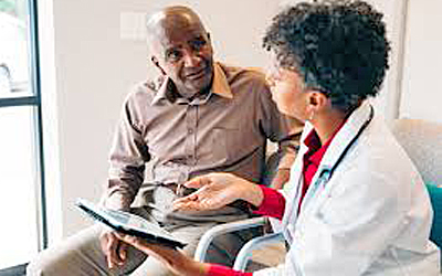 Doctor talks with patient.