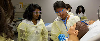 Students Practicing on a mannequin