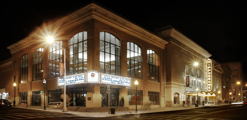 An exterior view of the Hippodrome theater building at night