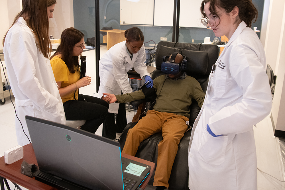 A participant hooked up to a VR set