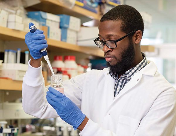 A student performing research in a medical lab