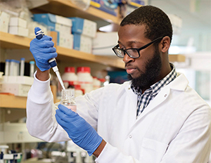 A student performing research in a medical lab